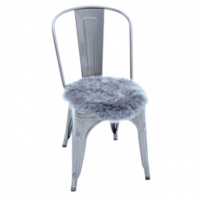 Brunt runt sittunderlag fårskinn